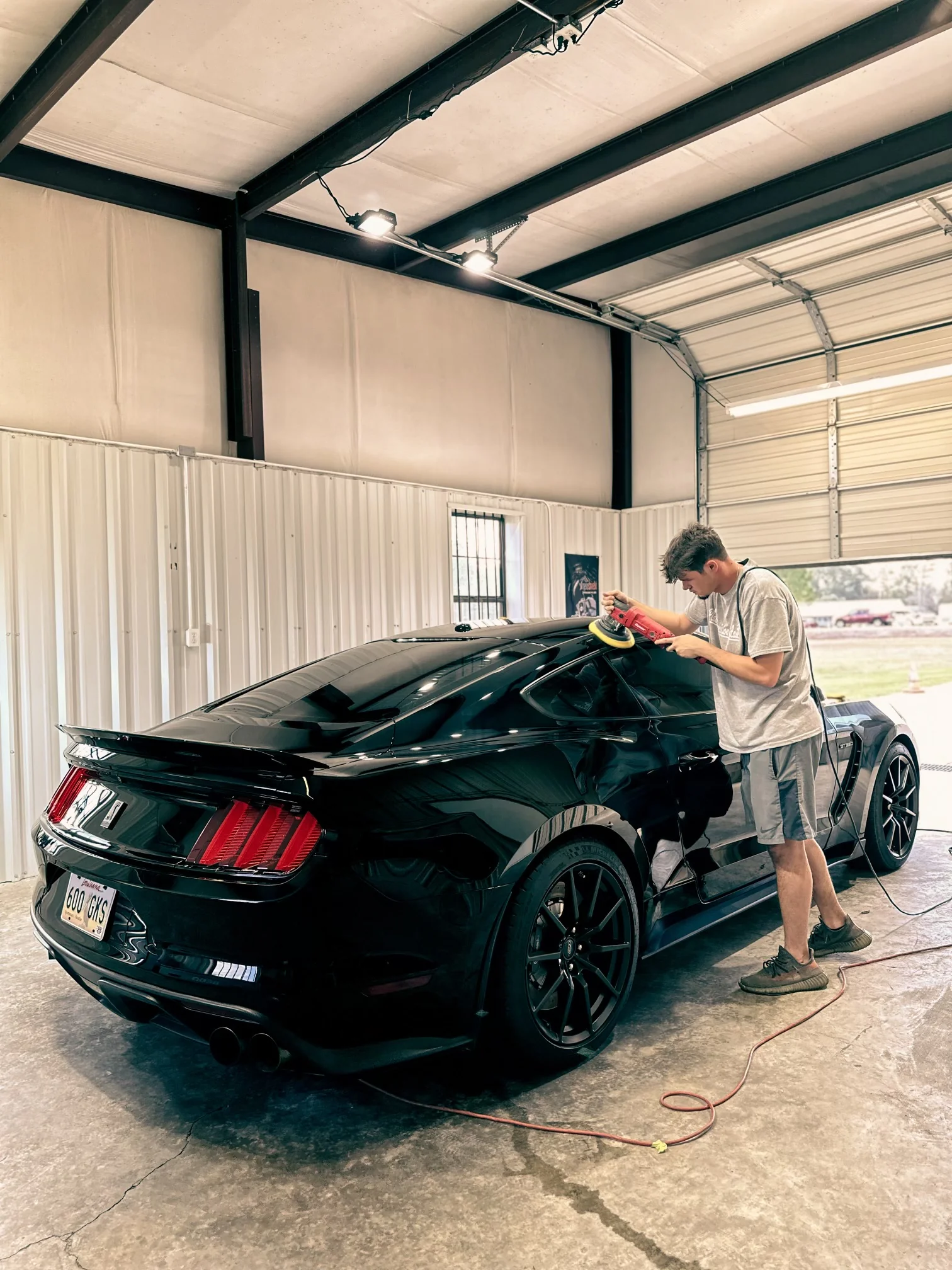 Hand polishing and paint correction at Platinum Precision Detail